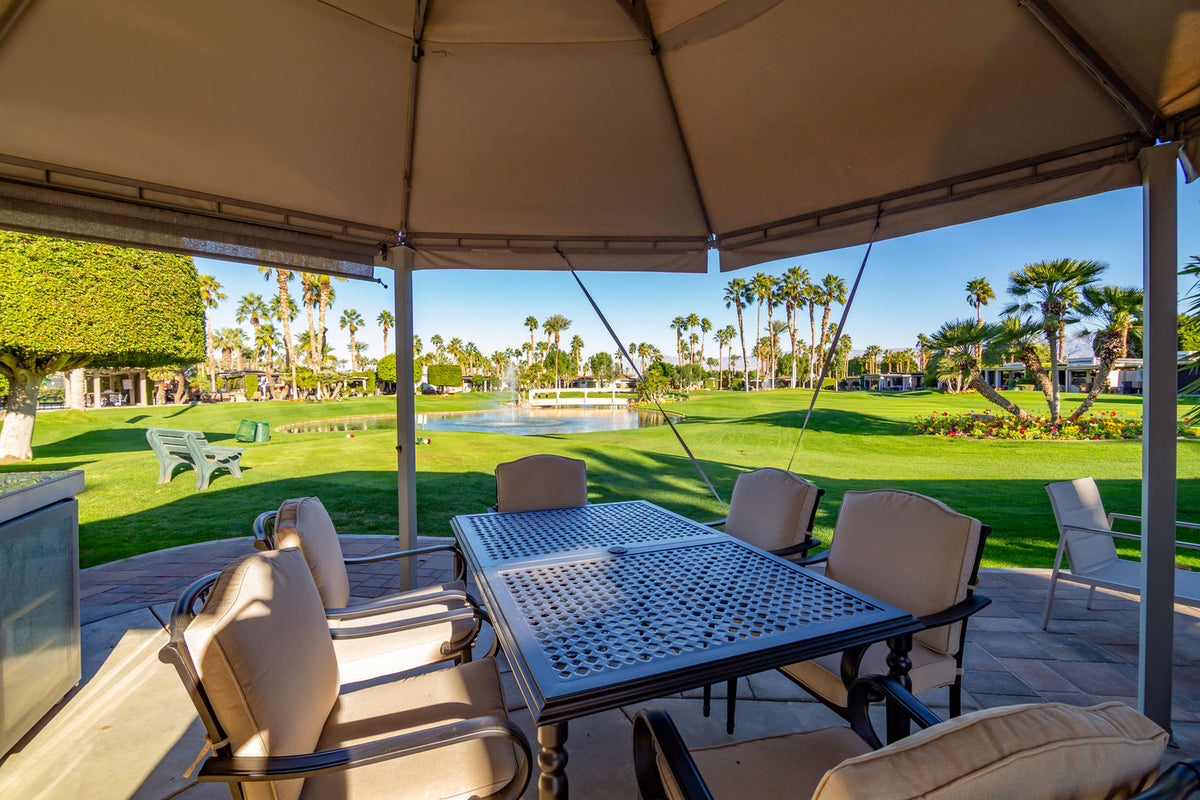 Existing patio and golf-and-lake view at ORI Lot 250