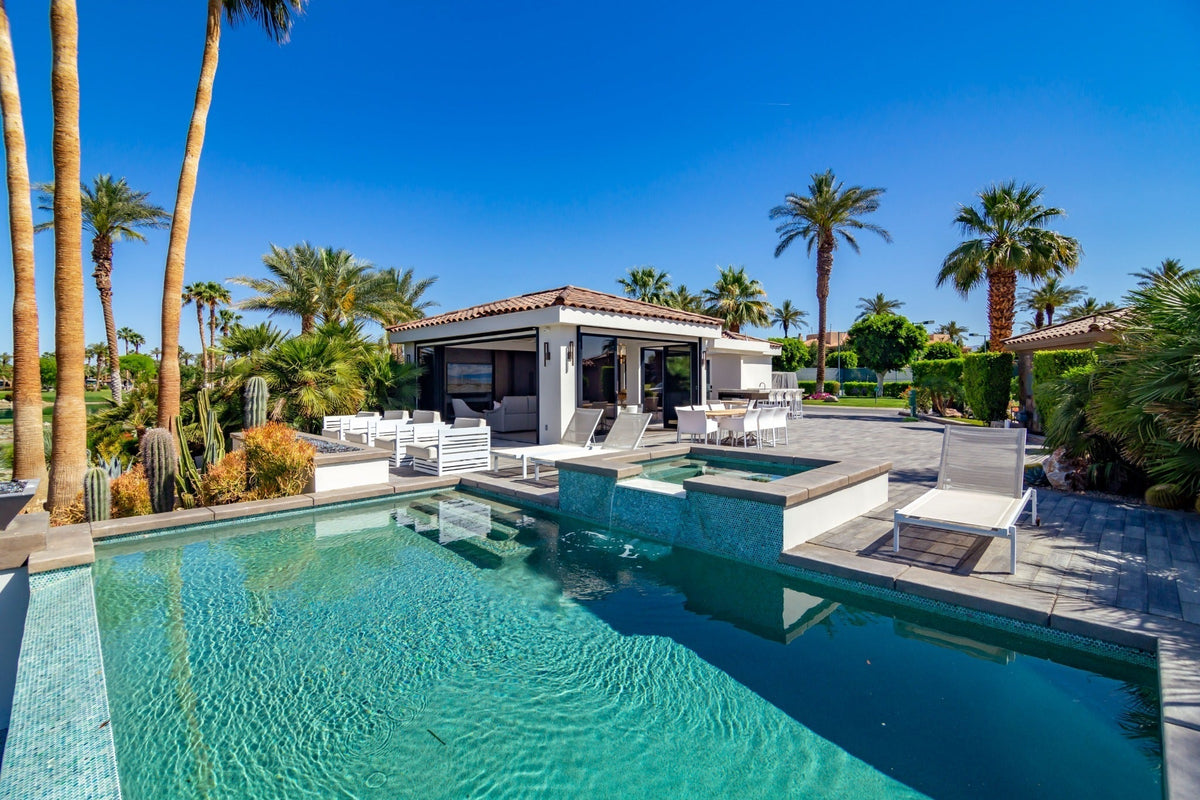 MCC Lot 145 exterior with pool and outdoor living area